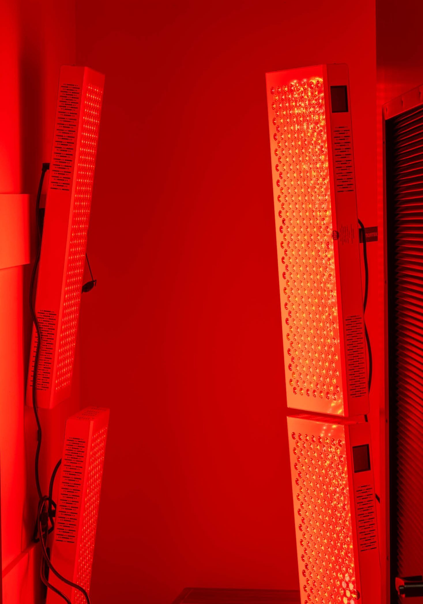 Red light therapy devices in a room.